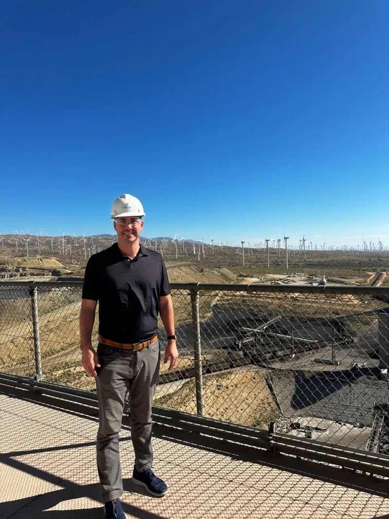 Sam Harper at a wind energy facility